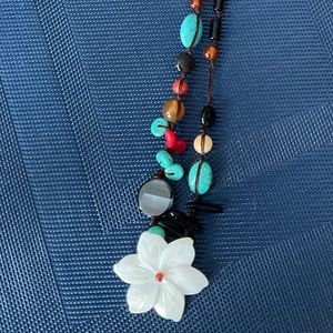 Glass Beaded Necklace.  Hangs 16”. Flower is glass too!  Excellent Condition!